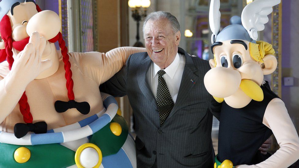 Albert Uderzo with his creations Asterix (r) and Obelix
