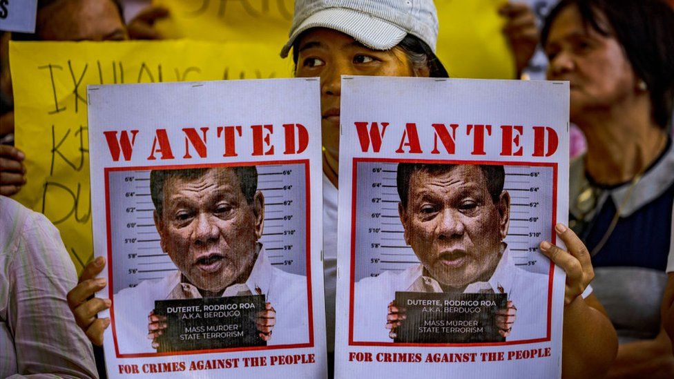 Activists take part in a protest outside the Quezon City Prosecutor's Office which summoned former President Rodrigo Duterte over a criminal complaint filed against him, on December 04, 2023 in Quezon City, Philippines.