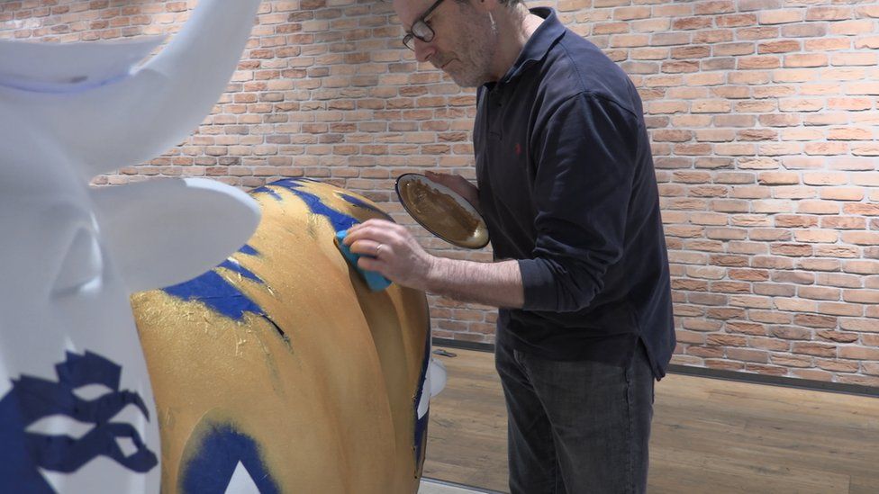 David Melling working on an ox sculpture