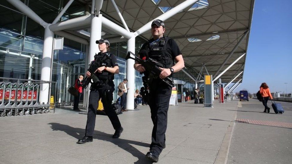 Armed police at Stansted Airport, Essex