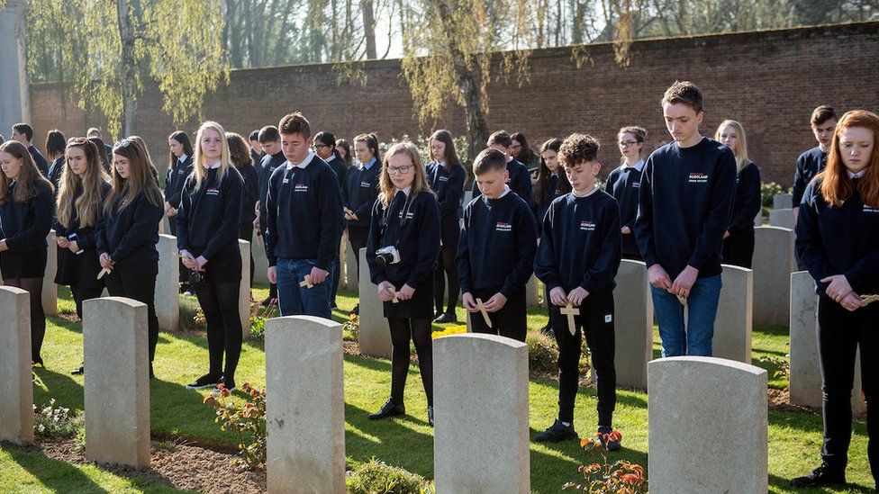 Schoolchildren at the graves of war dead in Arras