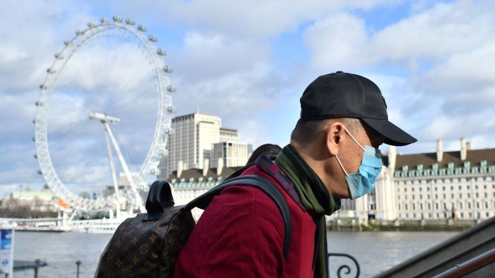 Man in London wearing a face mask