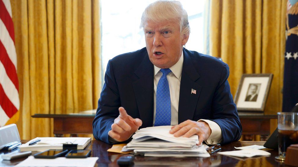 US President Donald Trump is interviewed by Reuters in the Oval Office at the White House in Washington