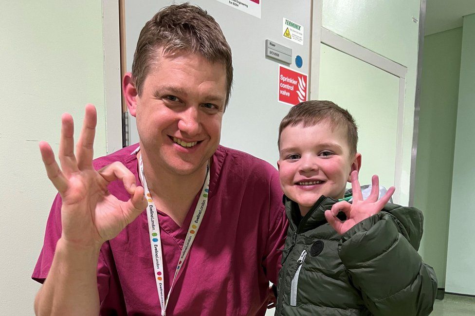 Dr Jon Lillie and Dáithí Mac Gabhann pose together for a photograph