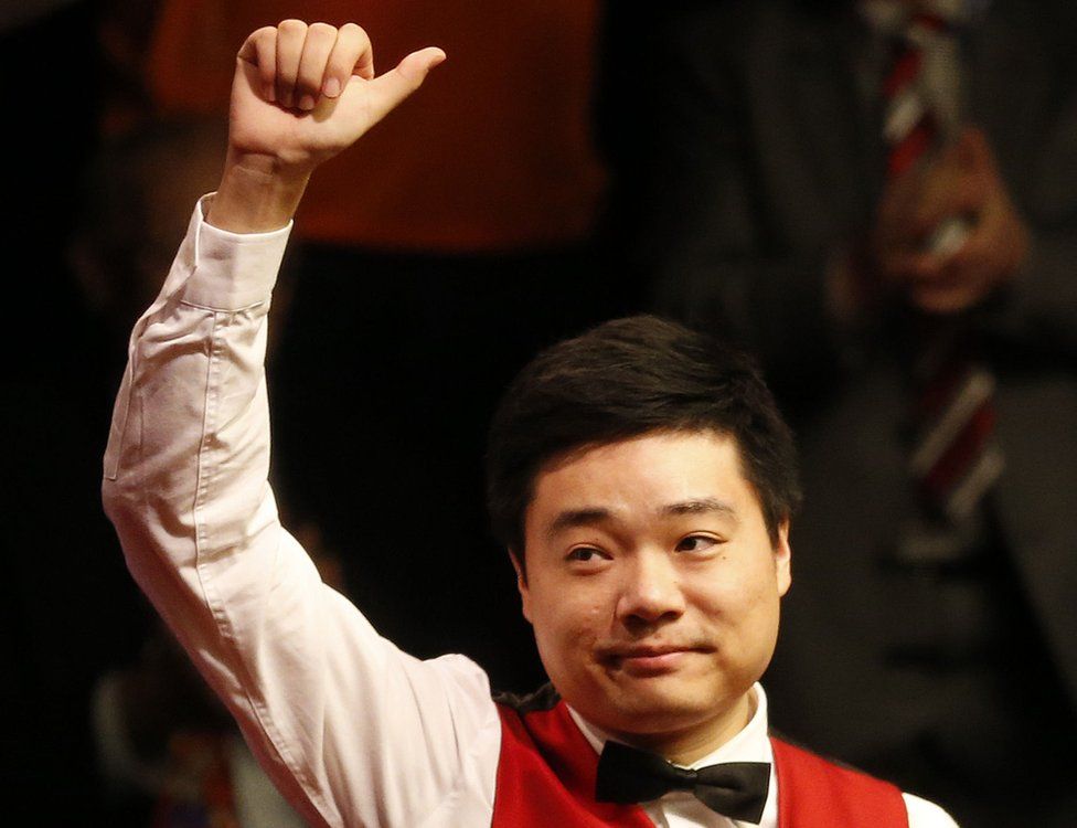 Ding Junhui celebrates winning the semi final match against Alan McManus (not in picture) during day fifteen of the Betfred Snooker World Championships at the Crucible Theatre, Sheffield on 30 April 2016.
