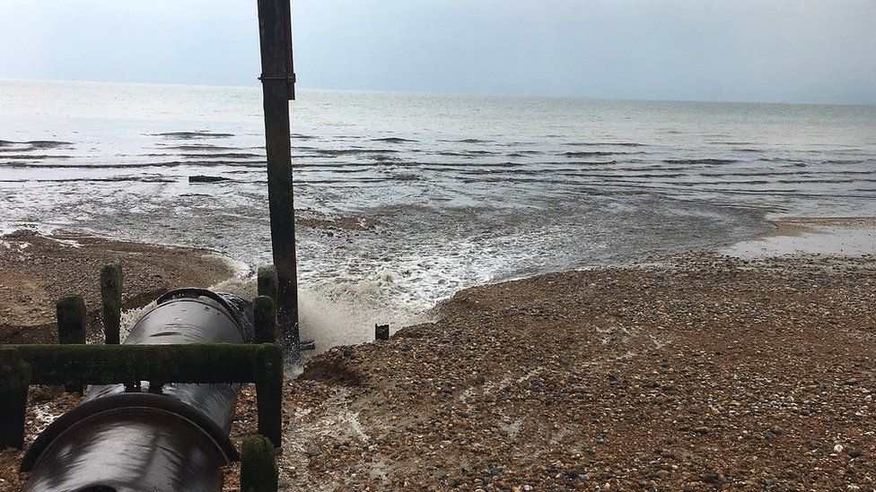 Wastewater being released at
                Bexhill beach
