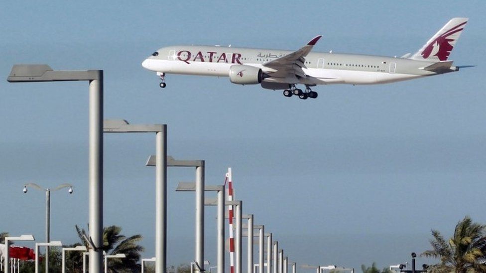 Qatar Airways aircraft over Doha