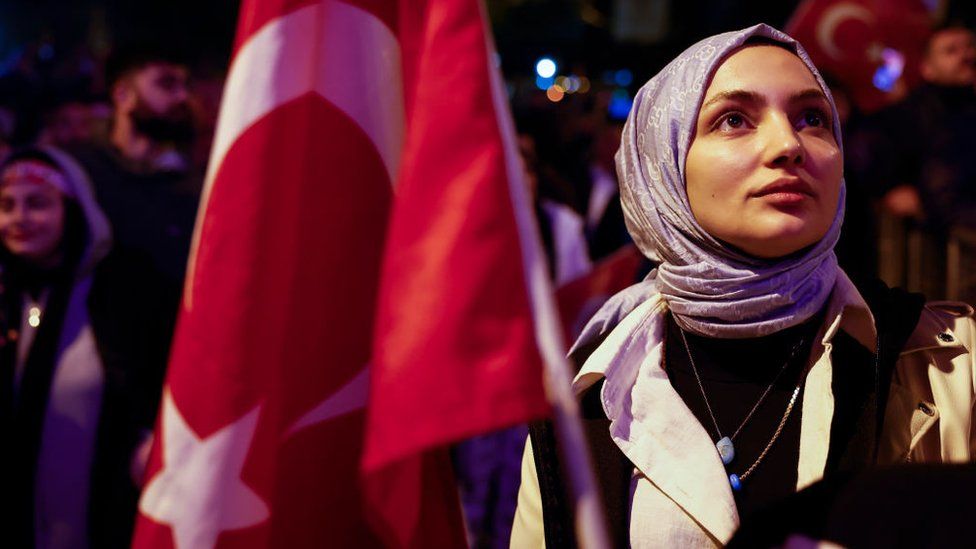 A female supporter of Turkish President Erdogan at the AK Party headquarters in Istanbul, Turkey