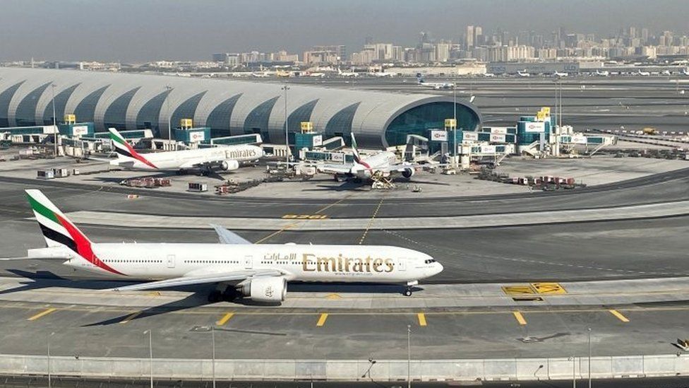 Emirates plane on tarmac at Dubai International