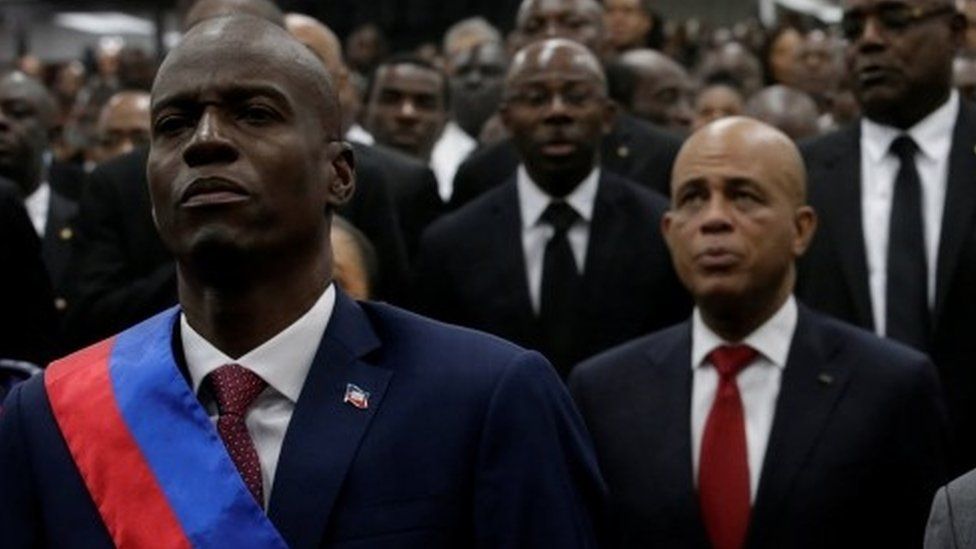 Jovenel Moise (left) and Michel Martelly at the swearing in ceremony