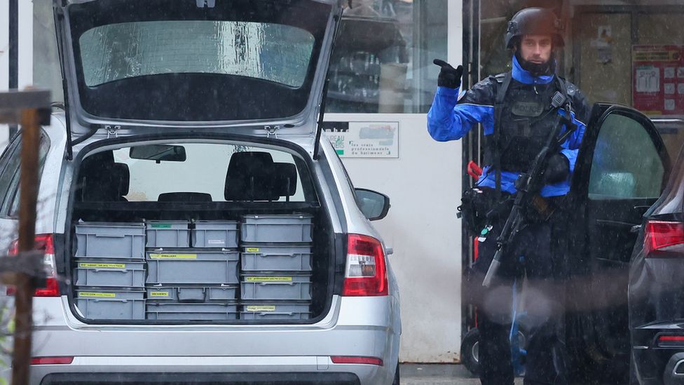 armed police officer after a shooting in the Swiss town of Sion on Monday