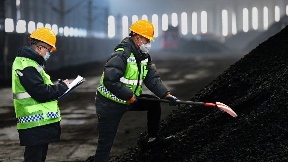 Employees working at a coal mine in China (file photo)