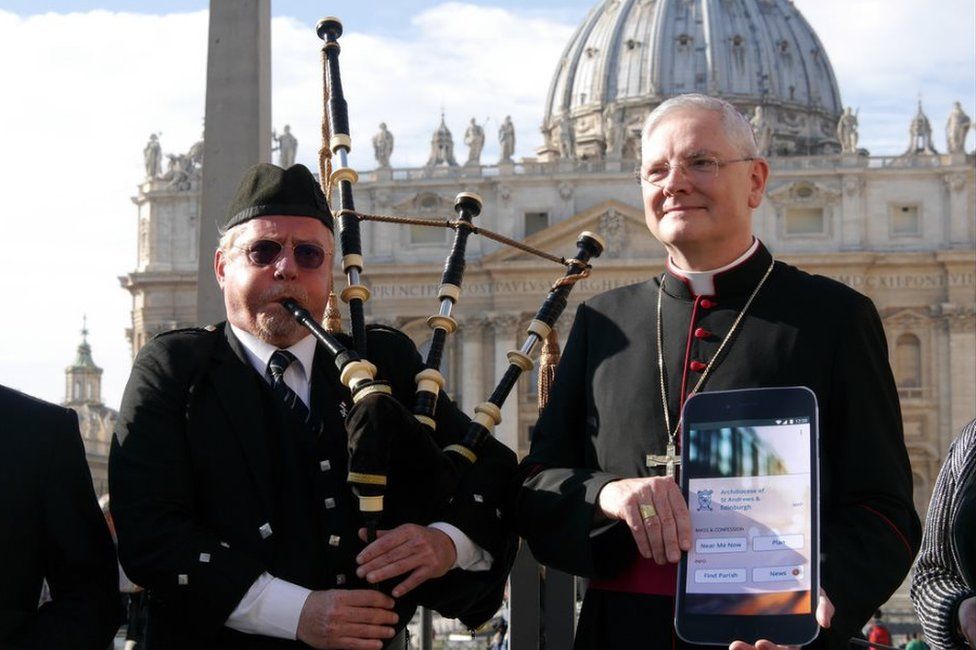 Archbishop Leo Cushley and Pipe Sergeant Mauro Nenci in St Peter's Square in Rome