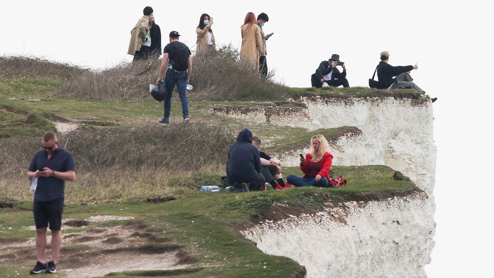 man edging on Birling Gap