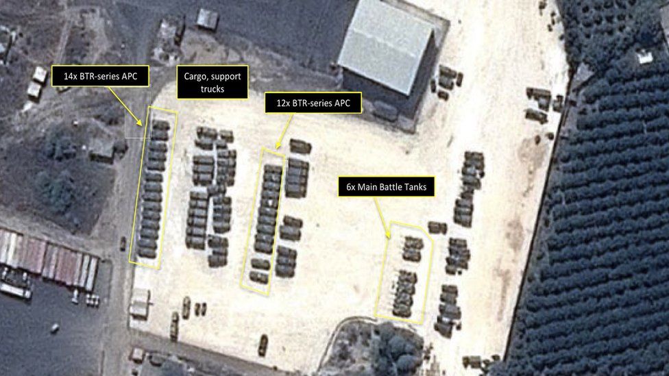 This Tuesday, Sept. 15, 2015 satellite image with annotations provided by GeoNorth, AllSource Analysis, Airbus shows Russian tanks and armed personnel carriers at an air base in Latakia province, Syria