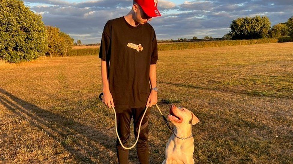 Jake Higgs and his dog Bane
