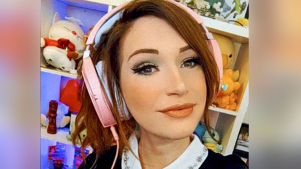 Gamer Lydia Ellery wearing headphones