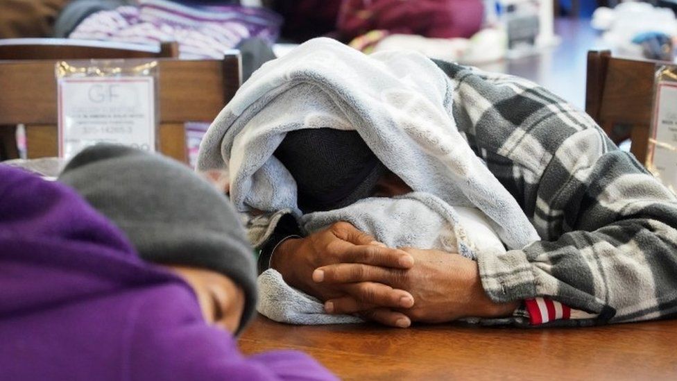 People take shelter at Gallery Furniture store in Houston