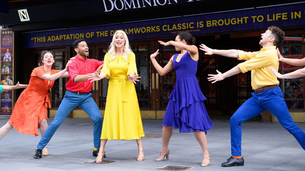 Denise Van Outen and other performers outside the Dominion Theatre in London on 5 May to mark the reopening of theatres