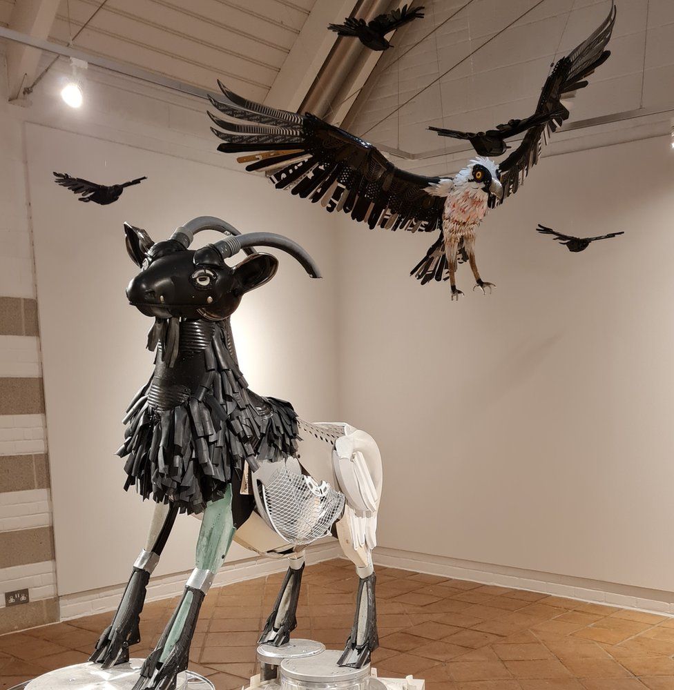 Wild goat and bearded vulture sculpture