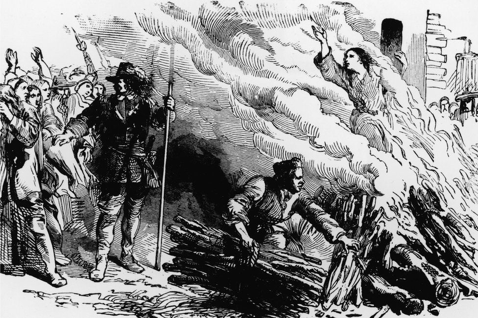 An illustration depicts a woman being burned at the stake for the crime of engaging in witchcraft, circa 1692. (Photo by Kean Collection/Getty Images)