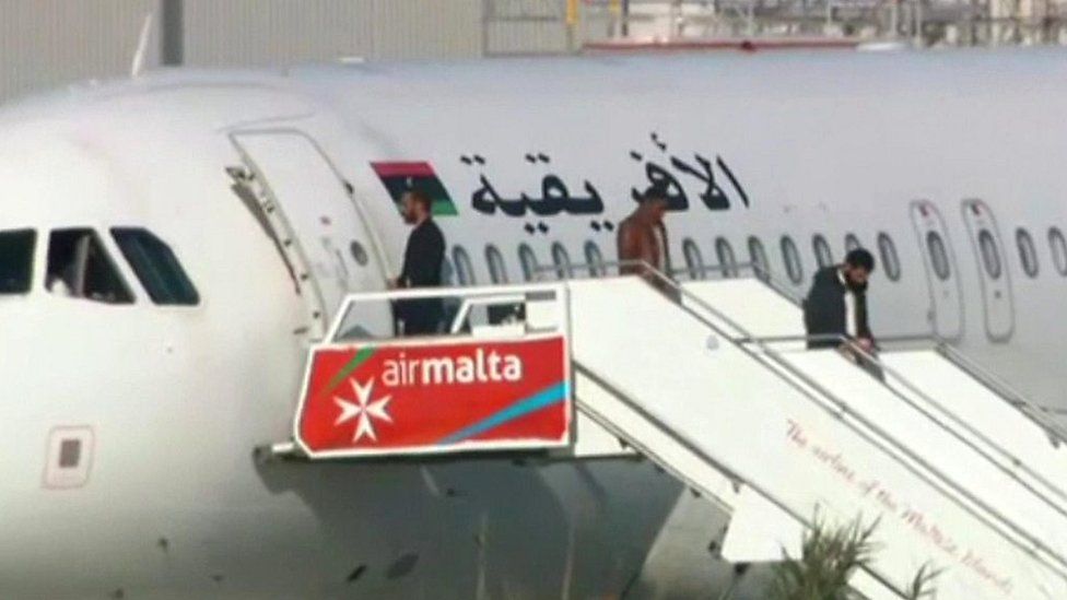 A number of people have been seen leaving a hijacked Libyan jet at Malta airport.