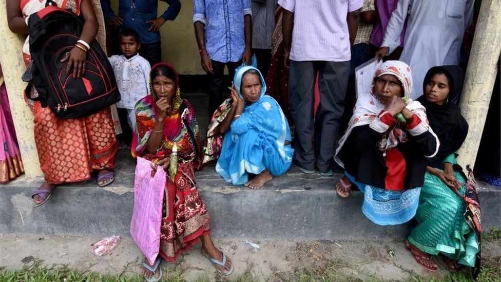 Villagers wait outside the National Register of Citizens (NRC) centre to get their documents verified by government officials, at Mayong Village in Morigaon district, in the northeastern state of Assam, India July 8, 2018.