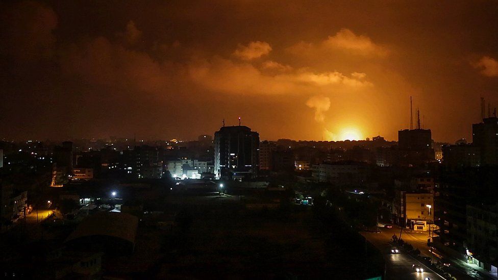 Smoke rises after an Israeli air strike in Gaza City on 15 March 2019