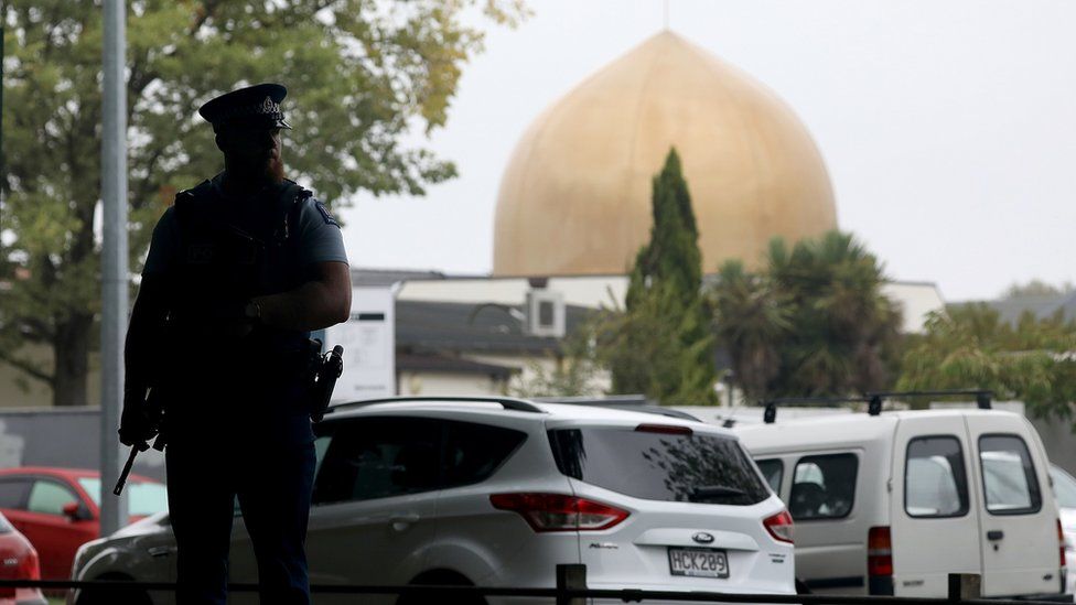 Policeman stands outside a Christchurch mosque