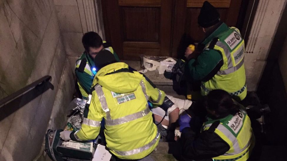 London Ambulance Service treating a patient