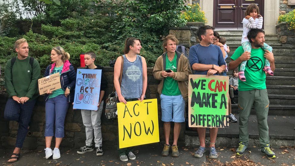 Climate change protesters outside States