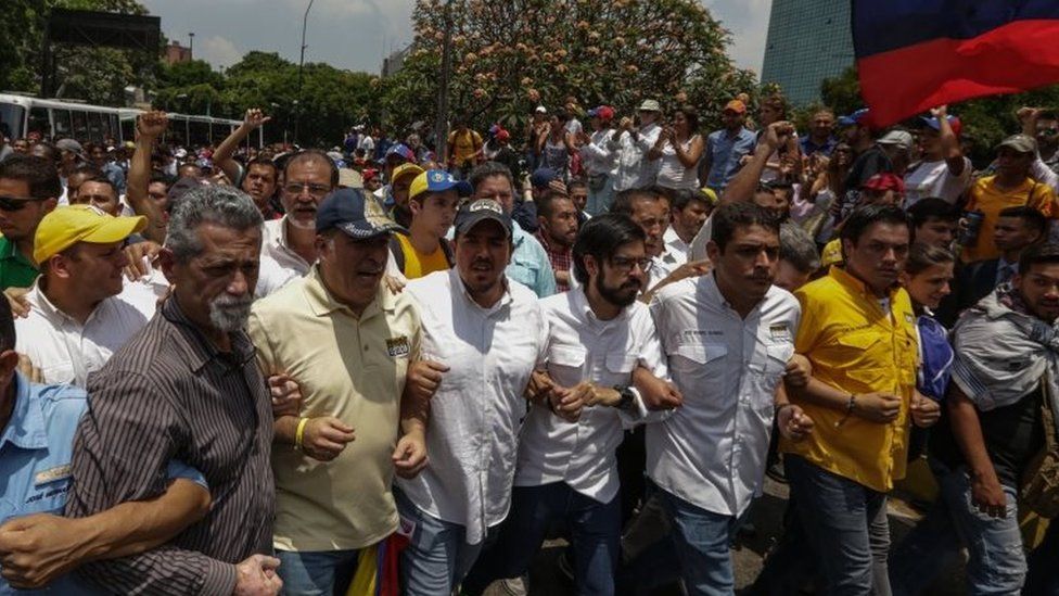 Several opposition deputies from Venezuelan National Assembly lead a protest in Caracas, Venezuela, on 10 April 2017.