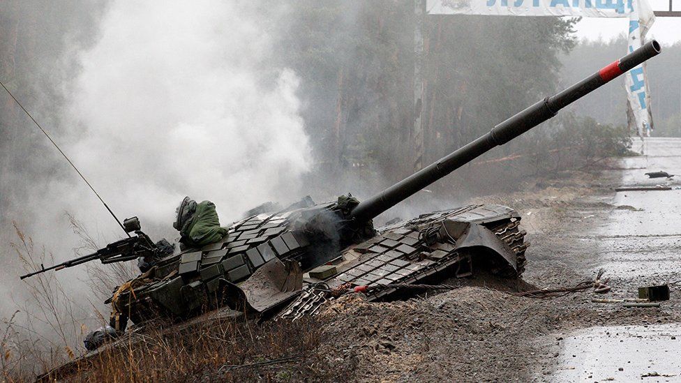 Russian tank destroyed by the Ukrainian forces on the side of a road in Luhansk region 26 February 2022