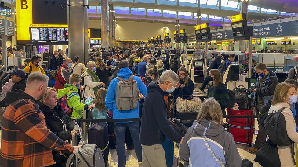 Passengers at Heathrow Airport on 9 April 2022