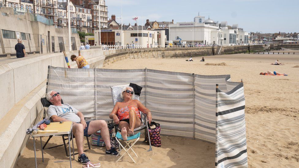 Sunbathers on Bridlington Beach in Yorkshire