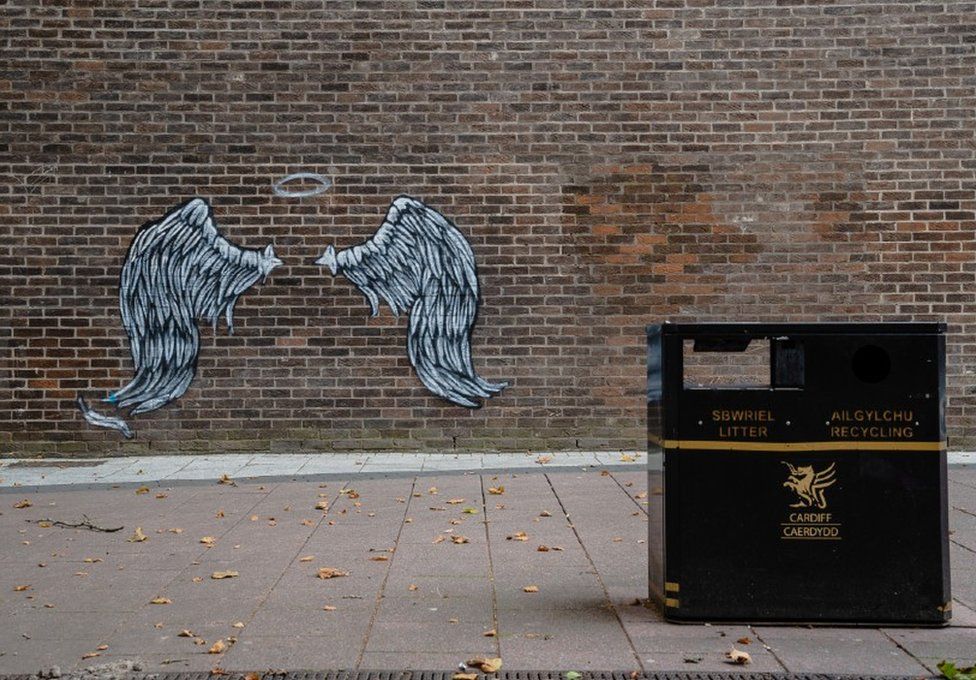 Angel wings and halo street art