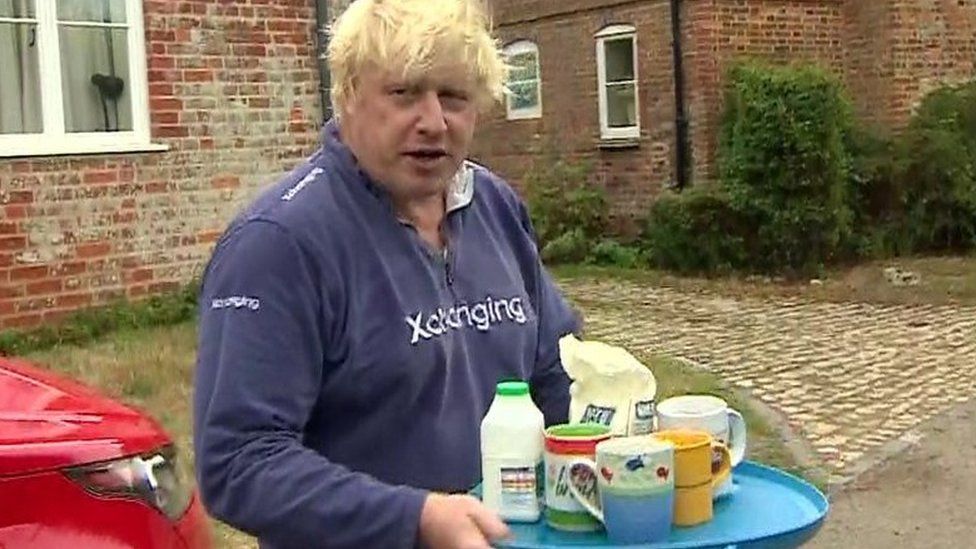 Boris Johnson with a tea tray