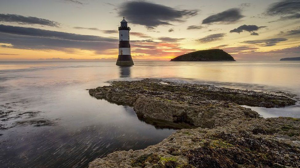 Trwyn Du lighthouse and puffin island at sunrise
