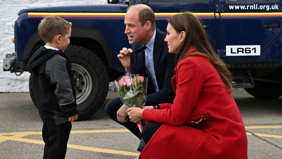 Theo, four, from Holyhead was picked from the crowd to meet the royals