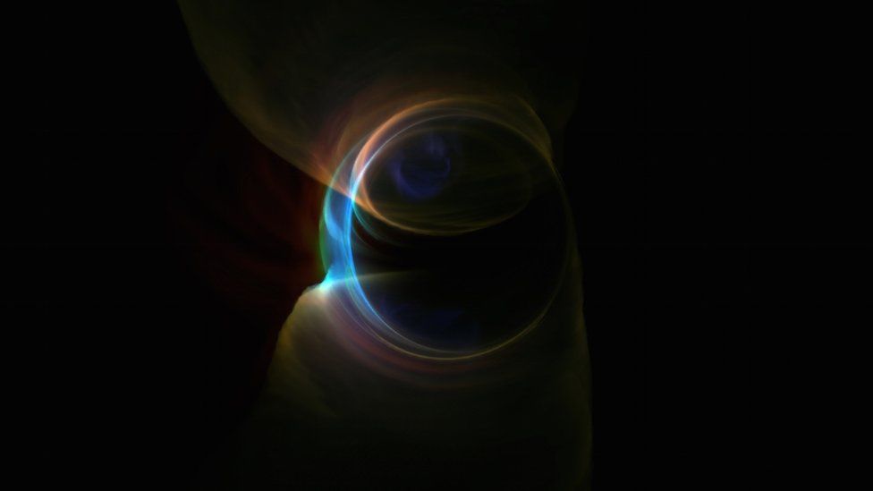 simulated illustration of a glowing crescent at the event horizon