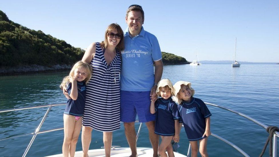 Karen Beddow with her family on a yacht