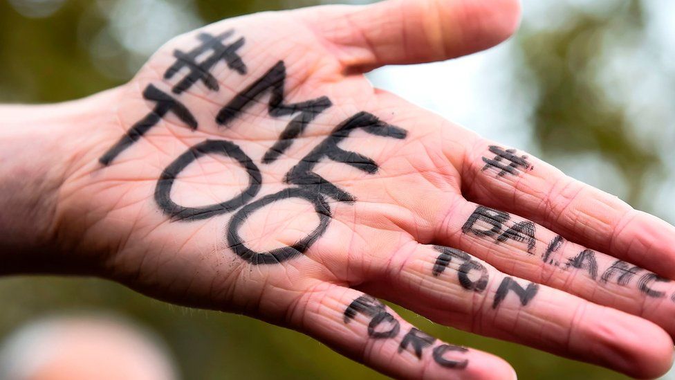 A MeToo message on a hand