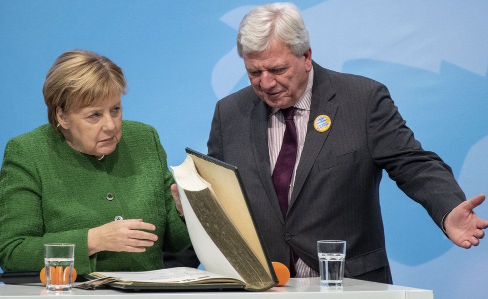 Chancellor Angela Merkel with lead Hesse candidate Volker Bouffier