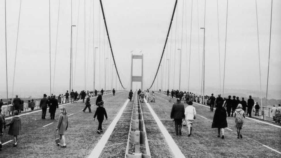 People walking along the Severn Bridge