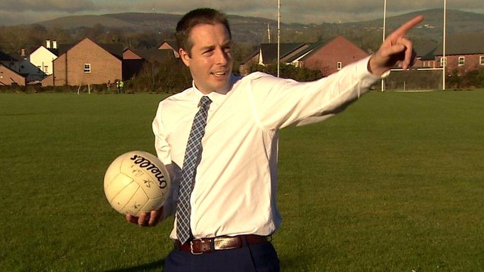 Paul Givan playing Gaelic football