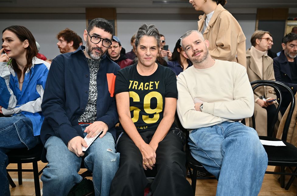 Robert Diament, Tracey Emin and Russell Tovey attend the JW Anderson AW24 show during London Fashion Week February 2024 at the Seymour Leisure Centre on February 18, 2024 in London, England.
