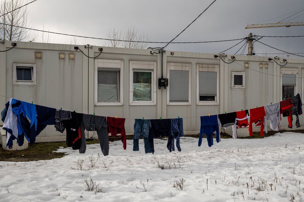 Washing hangs outside a the temporary units at the module city on the outskirts of Kharkiv.