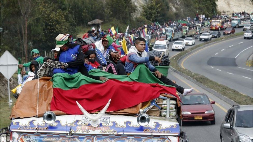 Indigenous people from Cauca region arrive in a buses caravan with the intention of speaking with Colombian President, Ivan Duque, in Soacha, Colombia, 18 October 2020.