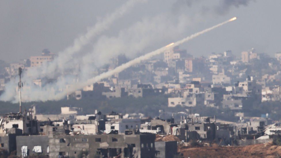 Rockets streak into the sky from Gaza towards Israel