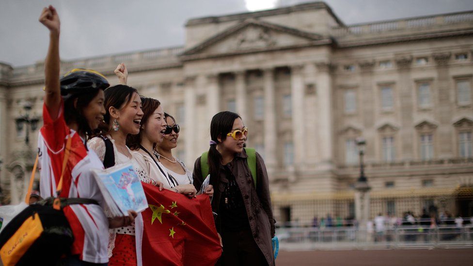 Chinese tourists outside Buckingham Palace during the London 2012 Olympics